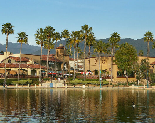 View of the waterfront at Mercado del Lago shopping center C-Store Fuel Station in Orange County